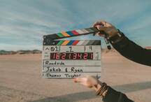 film production slate held in two hands